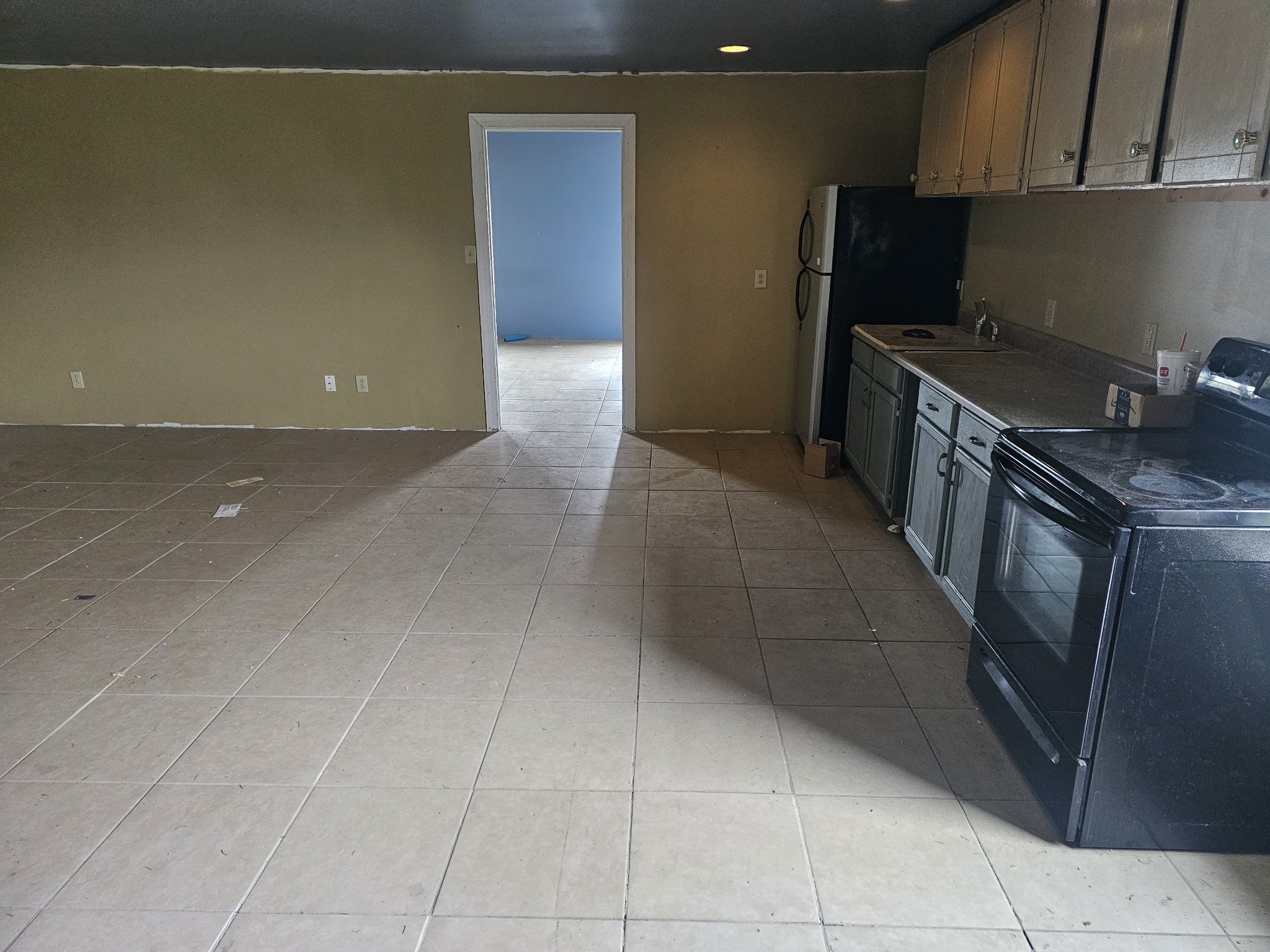 2104 Ruth Street Springfield, TN 37172 - Photo 48 of 61 a kitchen with stainless steel appliances a sink stove and cabinets