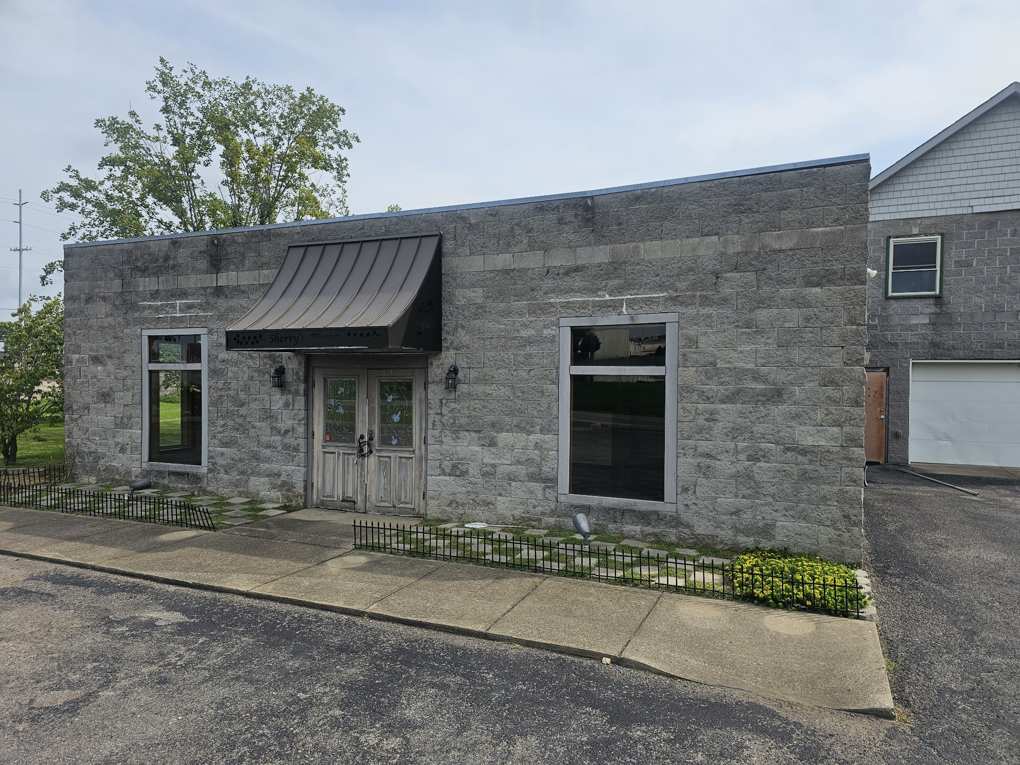 2104 Ruth Street Springfield, TN 37172 - Photo 61 of 61 front view of a brick house with a yard