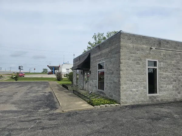 a view of a back yard of the house