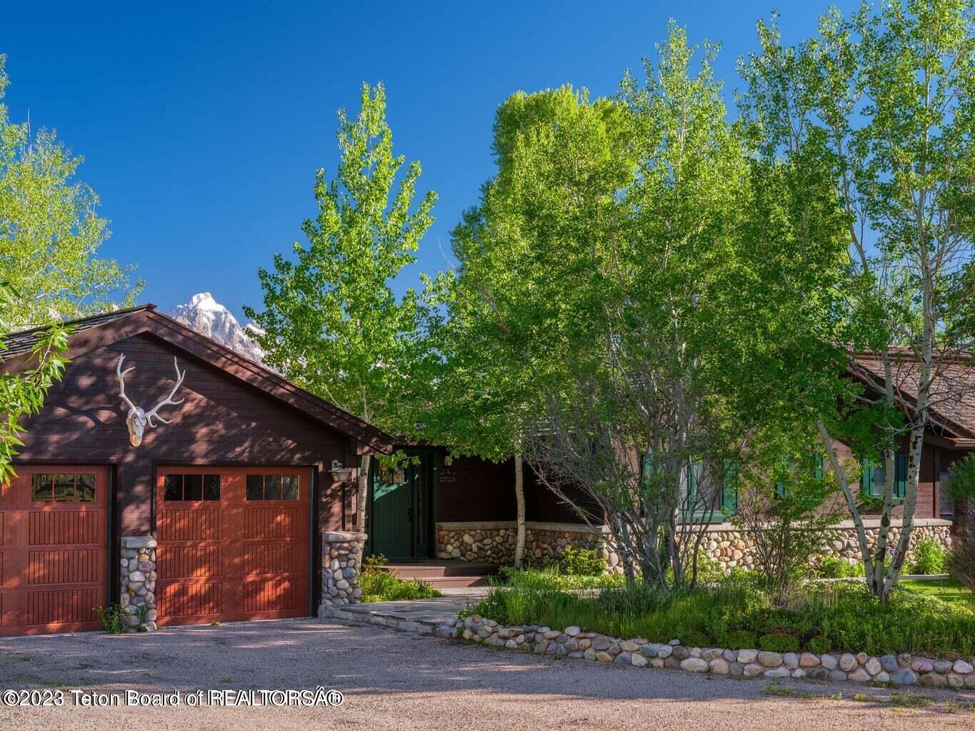 7403 Spring Gulch Road Jackson, WY 83001 - Photo 1 of 63 20220621141742586318000000-o