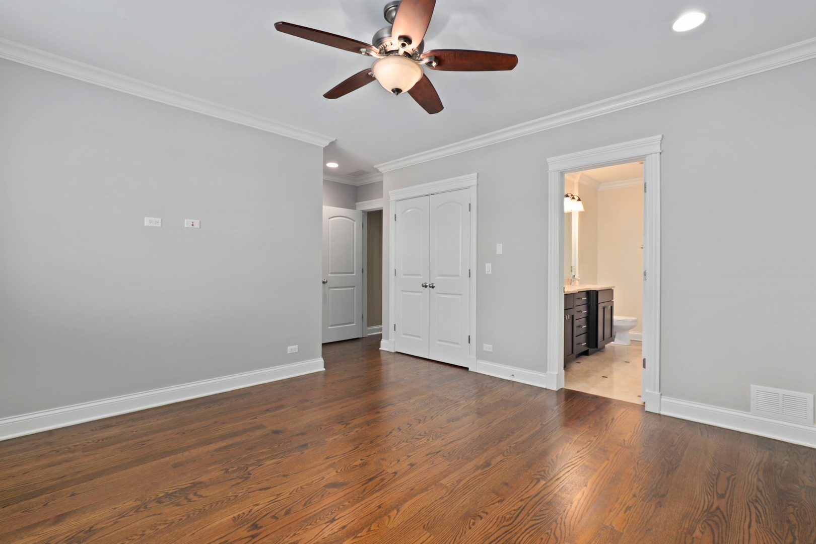 3549 North Reta Avenue, Unit 2 Chicago, IL 60657 - Photo 20 of 30 a view of an empty room with wooden floor