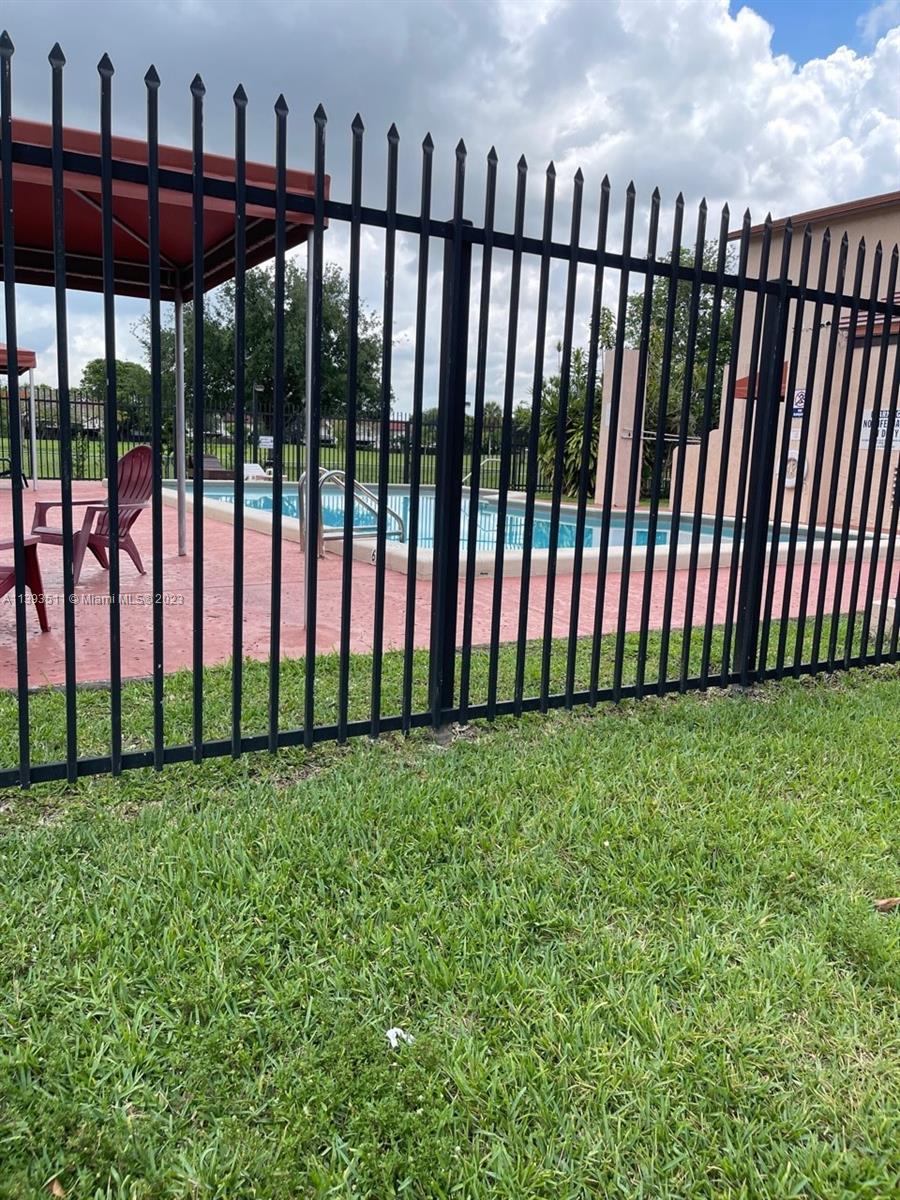 Doral Miami, FL 33172 - Photo 12 of 13 a view of a black gate