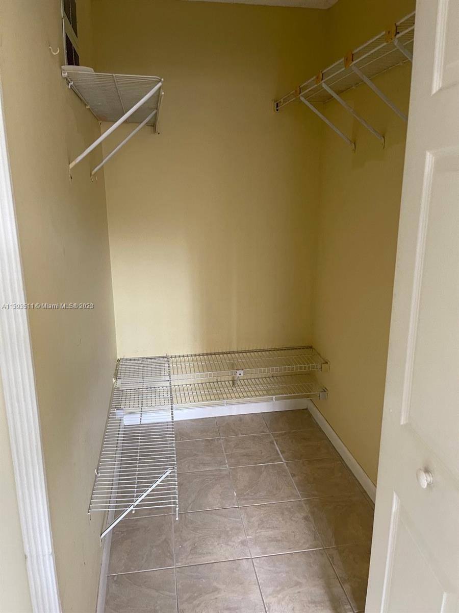 Doral Miami, FL 33172 - Photo 10 of 13 a bathroom with a shower