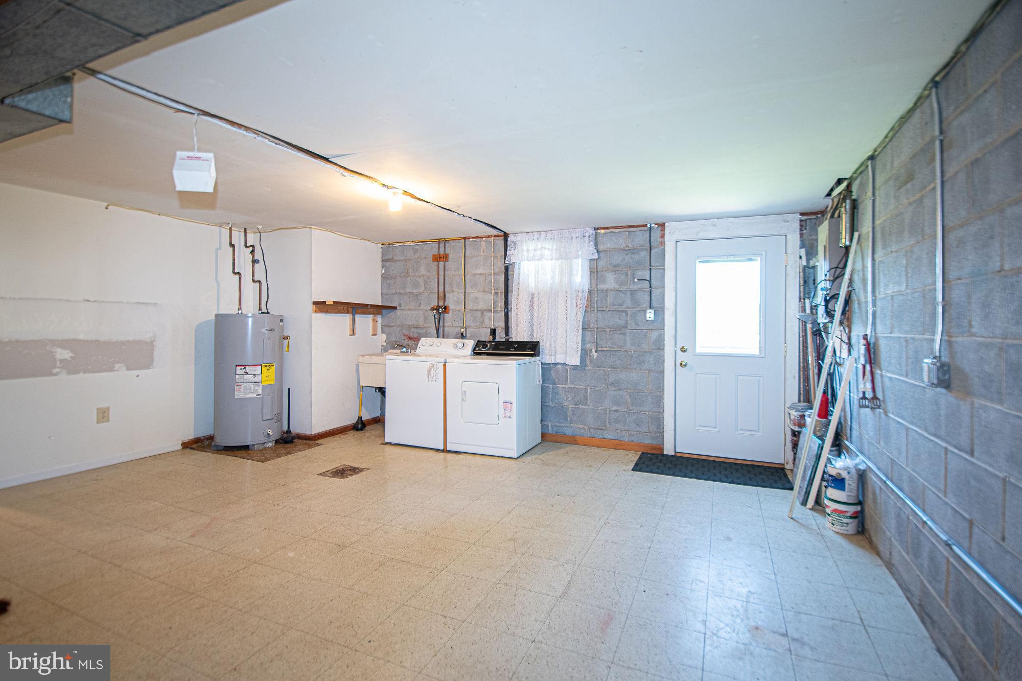 7 Ridge Road Front Royal, VA 22630 - Photo 46 of 48 Utility room w newer water heater, W/D convey
