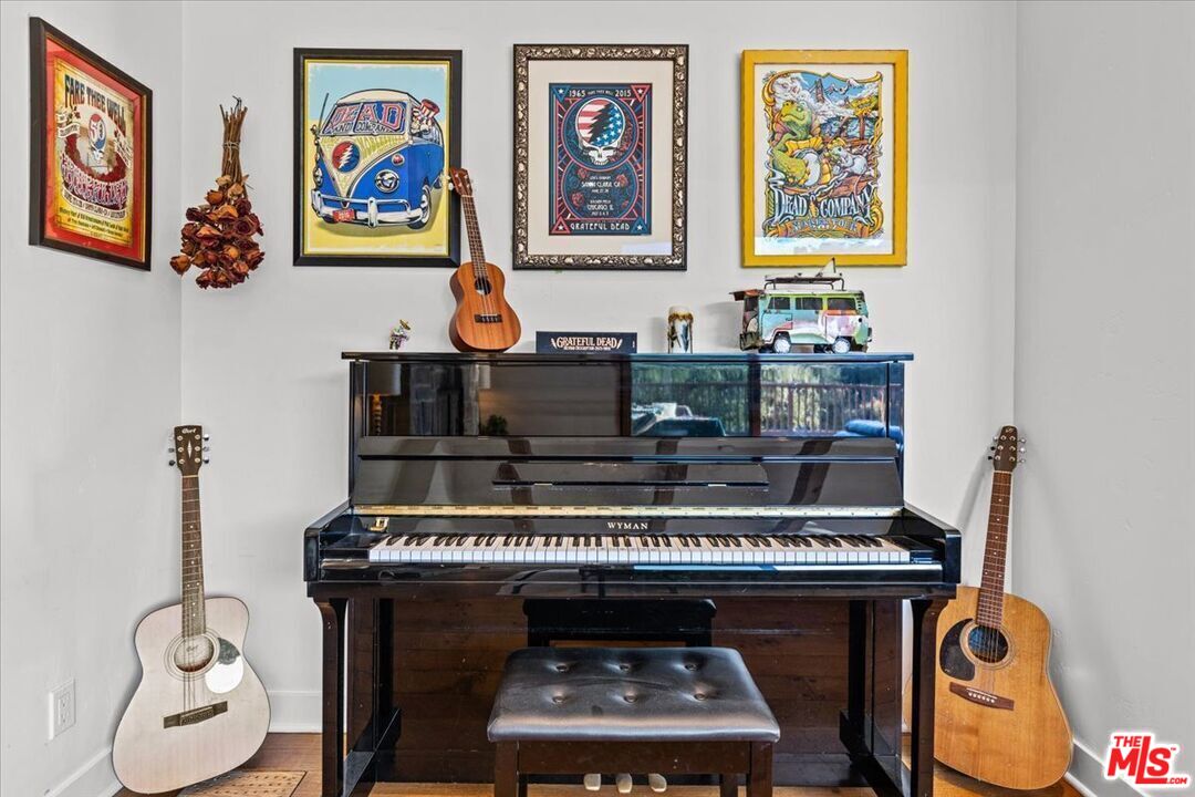 2373 Tuna Canyon Road Topanga, CA 90290 - Photo 13 of 54 a living room with furniture and paintings