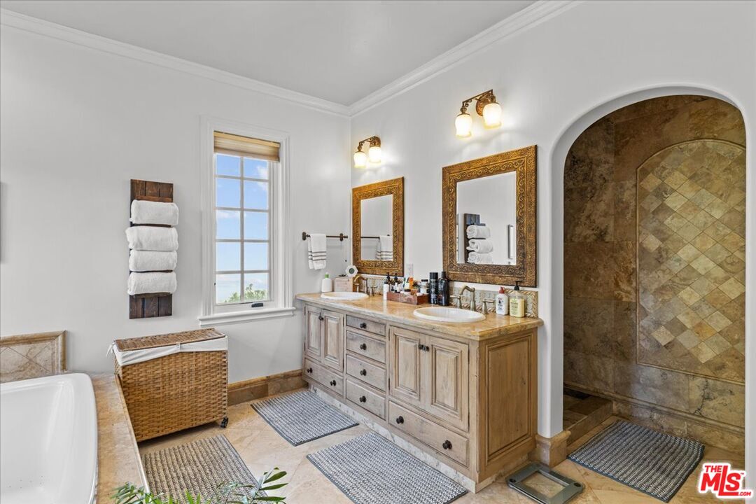 2373 Tuna Canyon Road Topanga, CA 90290 - Photo 24 of 54 a view of a bathroom with dual sinks