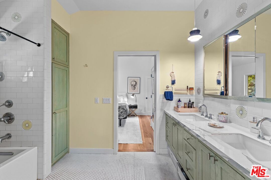 2373 Tuna Canyon Road Topanga, CA 90290 - Photo 32 of 54 a spacious bathroom with a tub sink and mirror