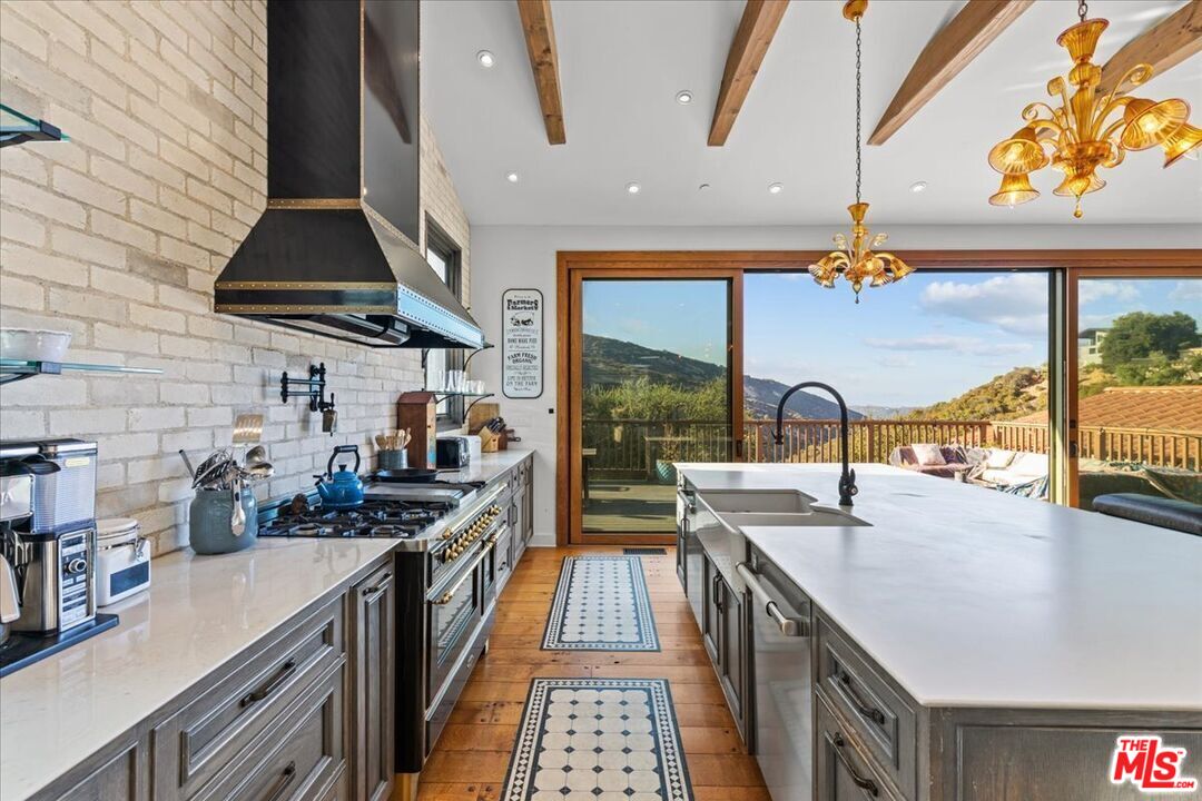 2373 Tuna Canyon Road Topanga, CA 90290 - Photo 4 of 54 a kitchen with lots of counter top space