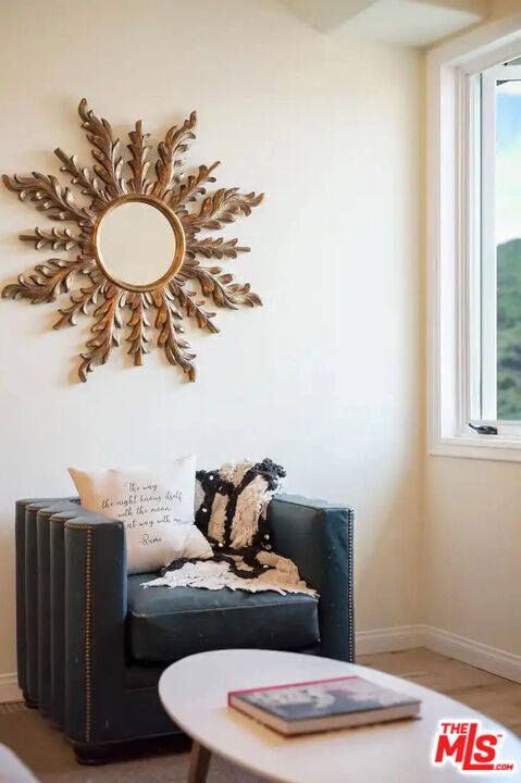 2373 Tuna Canyon Road Topanga, CA 90290 - Photo 51 of 54 a table with a vase and chandelier