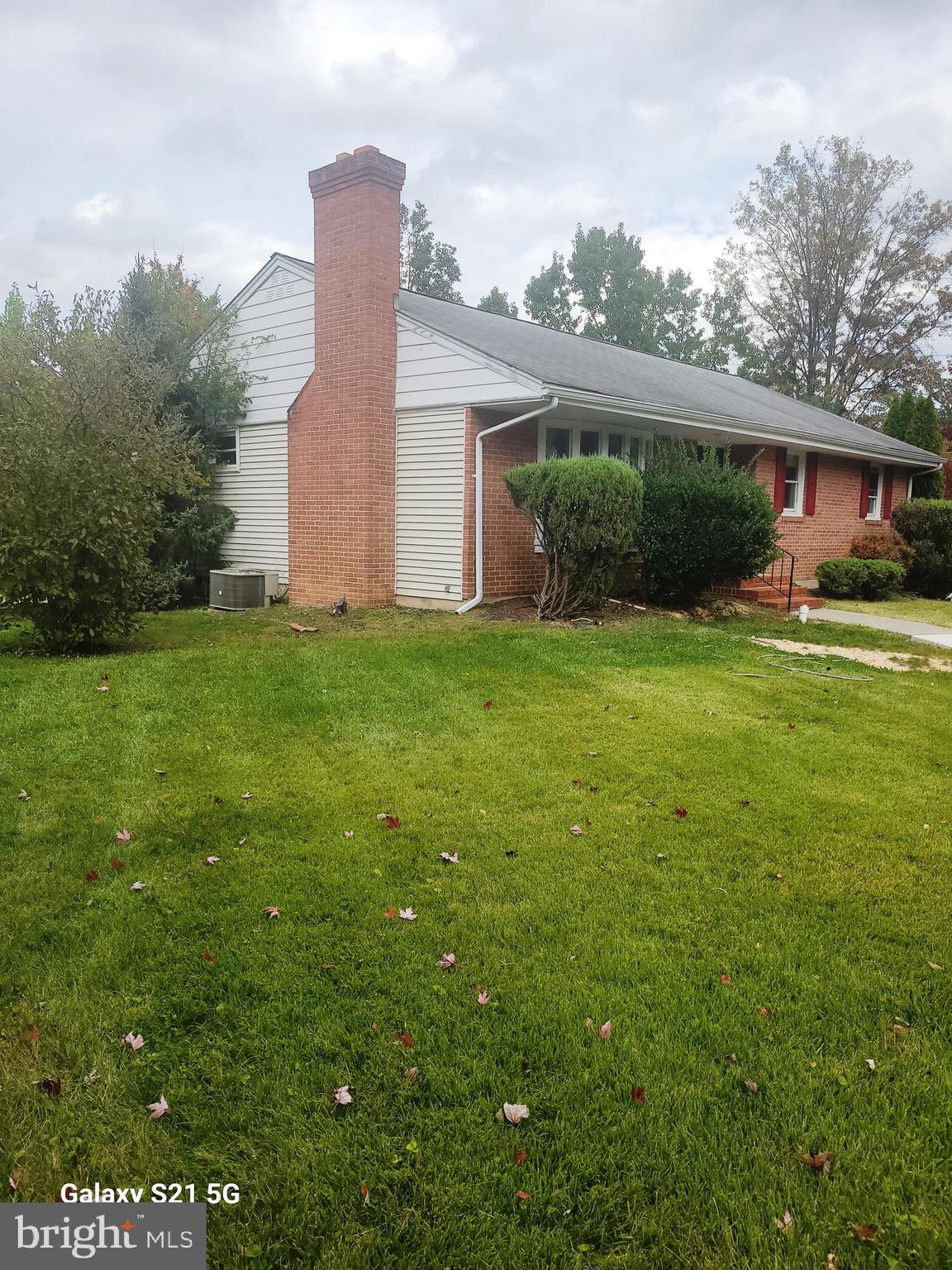 116 Gorsuch Road Lutherville-Timonium, MD 21093 - Photo 5 of 27 a view of a house with a yard and potted plants