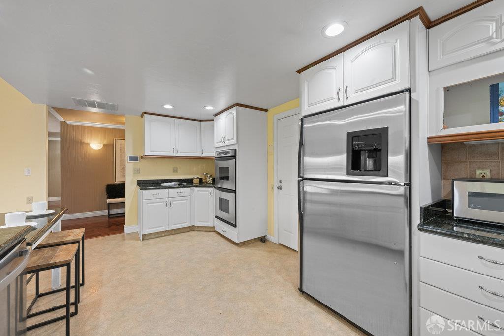 4572 Ross Gate Way Pleasanton, CA 94566 - Photo 21 of 58 a kitchen with stainless steel appliances a refrigerator sink and stove