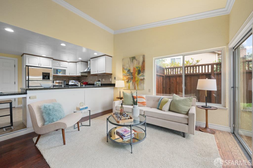4572 Ross Gate Way Pleasanton, CA 94566 - Photo 25 of 58 a living room with furniture and a large window