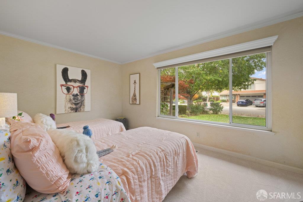 4572 Ross Gate Way Pleasanton, CA 94566 - Photo 36 of 58 a bedroom with a bed and a large window