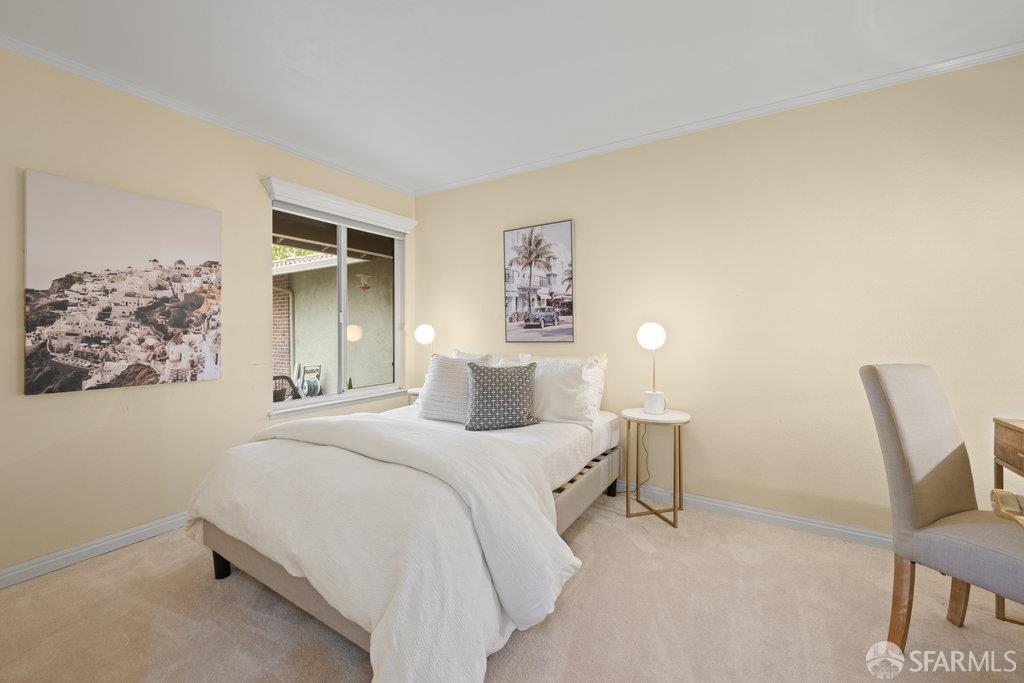 4572 Ross Gate Way Pleasanton, CA 94566 - Photo 39 of 58 a bedroom with a bed and a chair