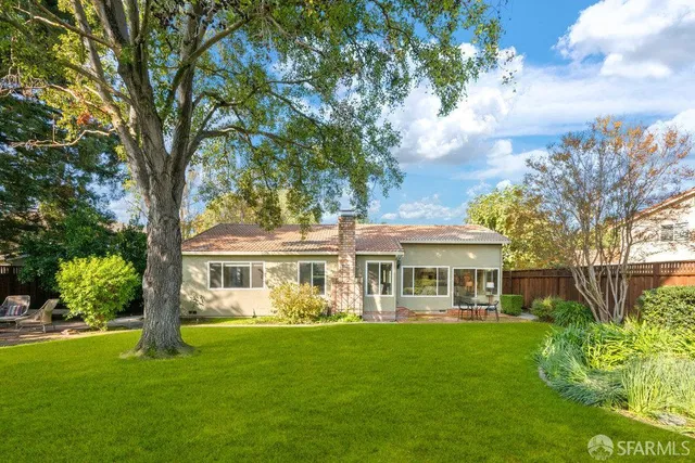 a view of a house with a big yard