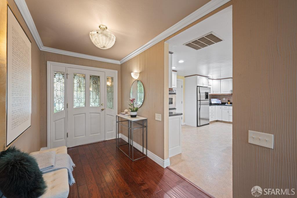 4572 Ross Gate Way Pleasanton, CA 94566 - Photo 5 of 58 a very nice looking room with a large bed and wooden floor