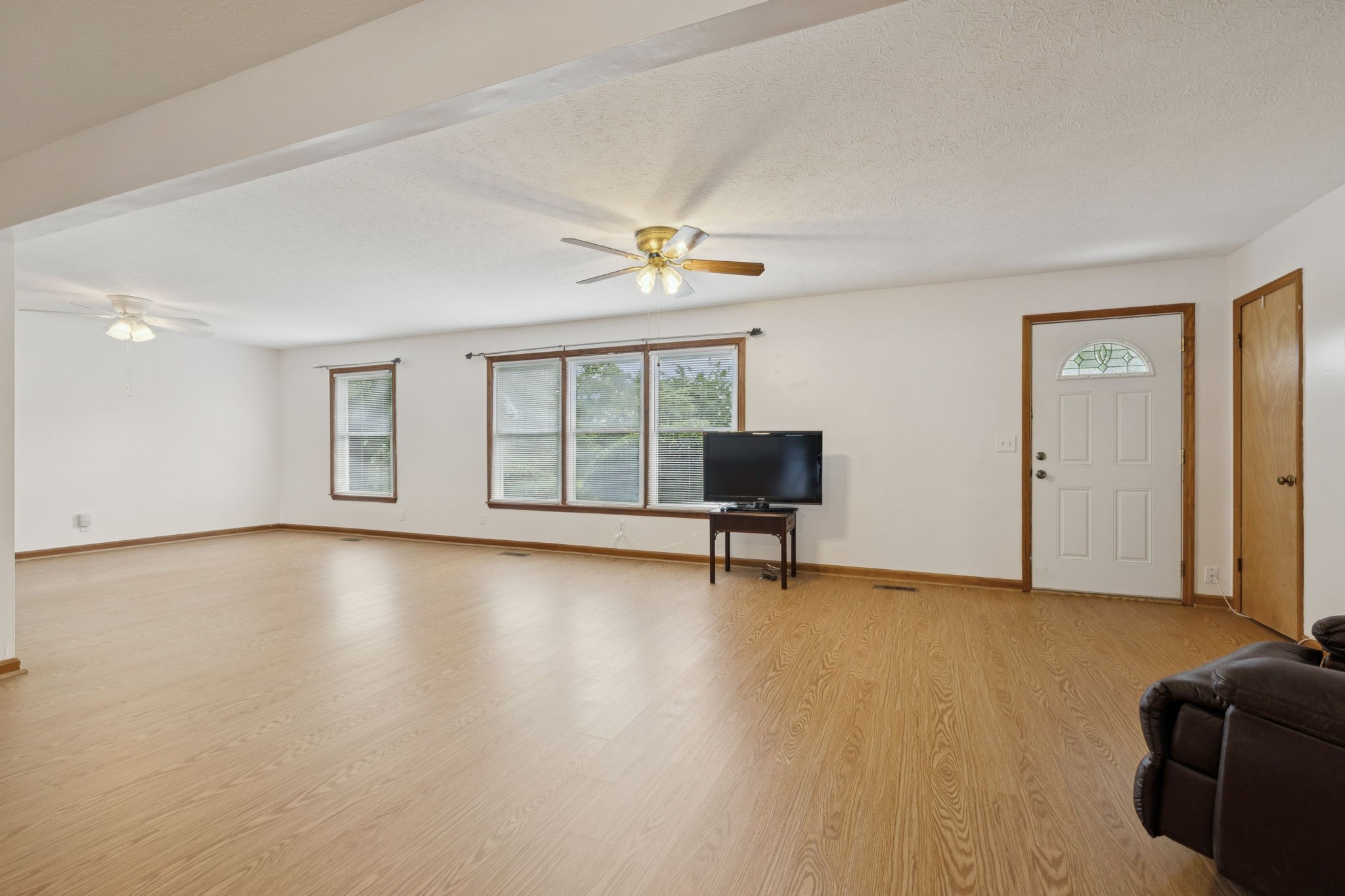 115 White Road Portland, TN 37148 - Photo 14 of 44 a view of an empty room with window and a kitchen