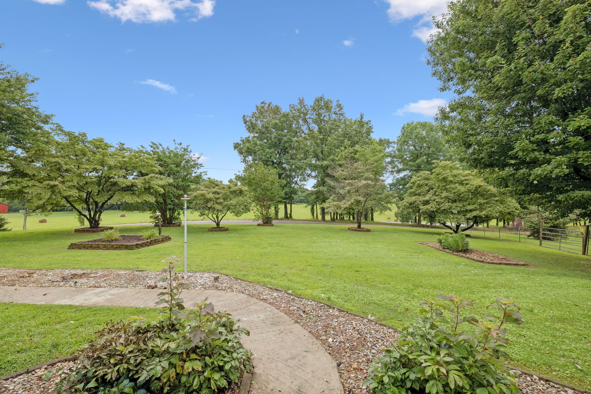 115 White Road Portland, TN 37148 - Photo 2 of 44 a view of a park with large trees