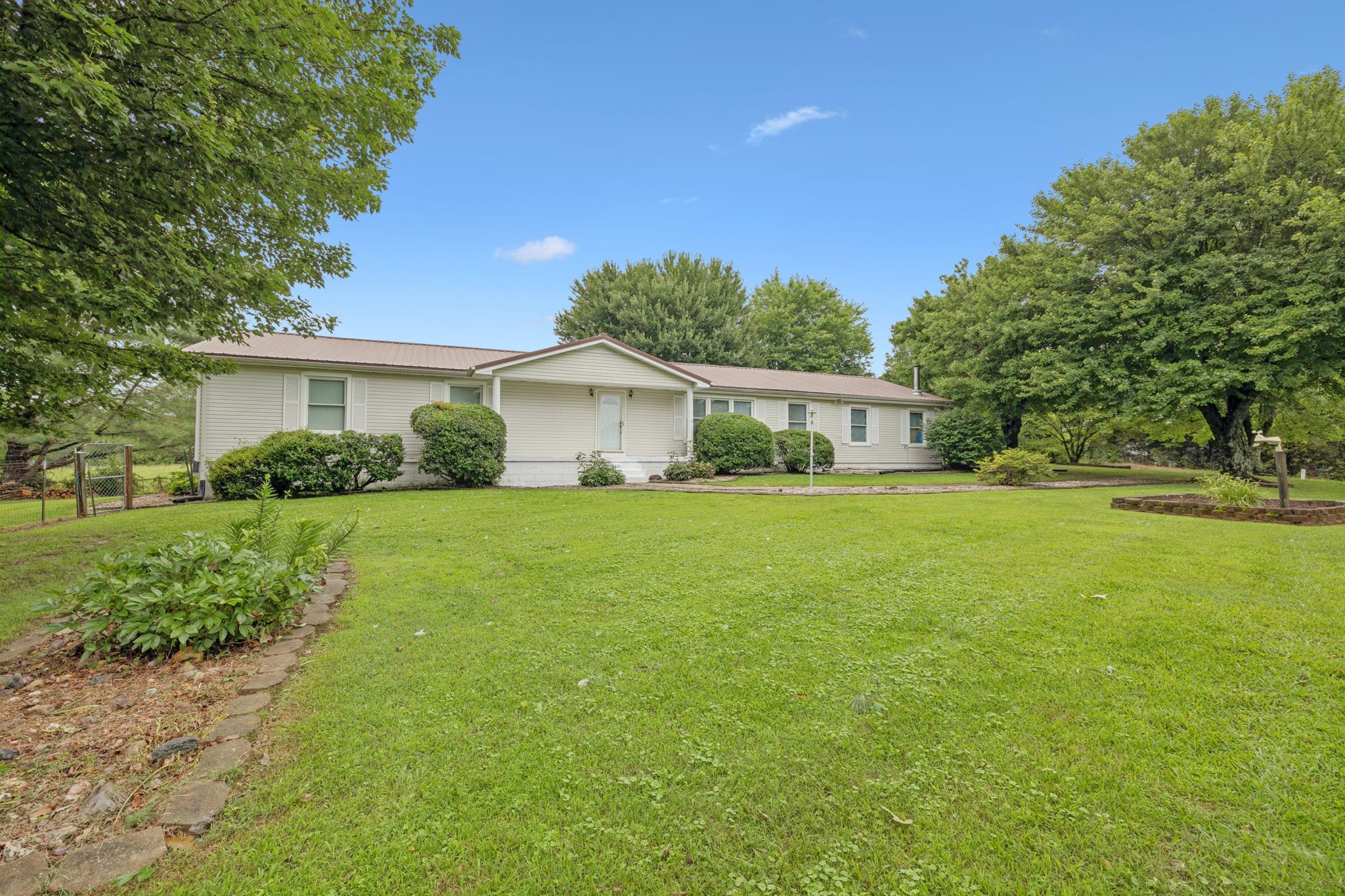 115 White Road Portland, TN 37148 - Photo 3 of 44 a front view of house with yard and green space