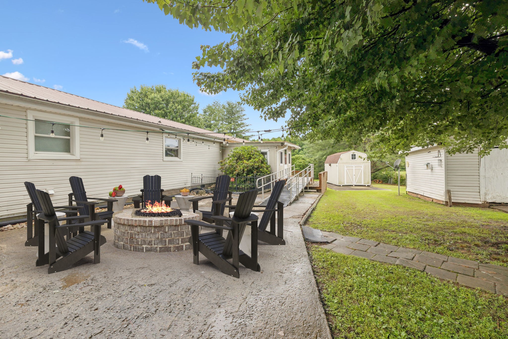 115 White Road Portland, TN 37148 - Photo 36 of 44 a view of a patio with table and chairs and potted plants