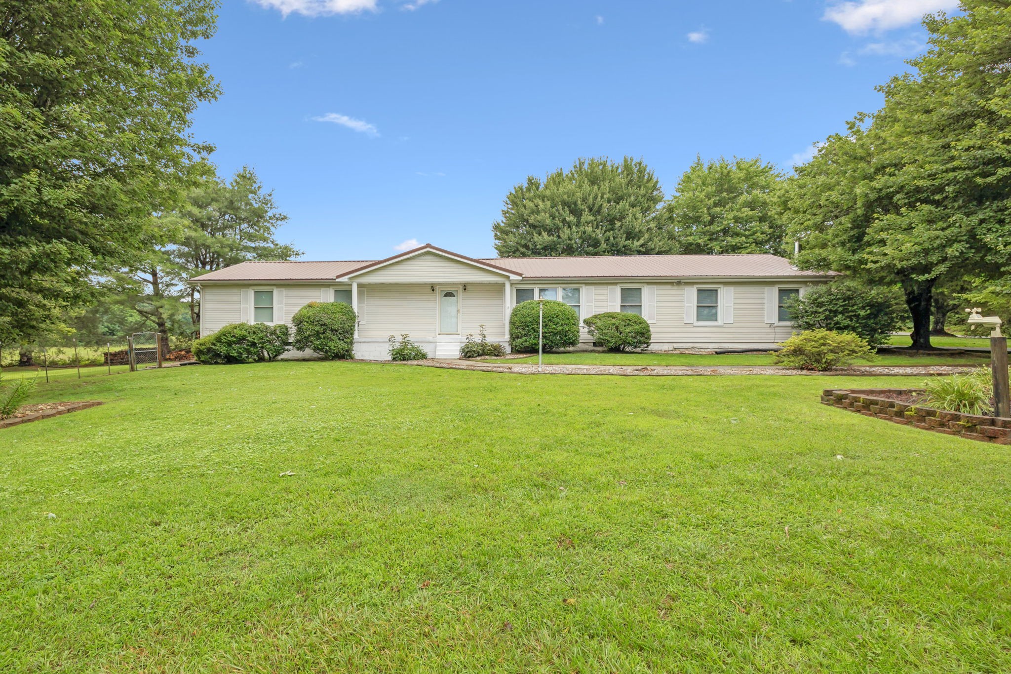 115 White Road Portland, TN 37148 - Photo 4 of 44 a house view with a garden space