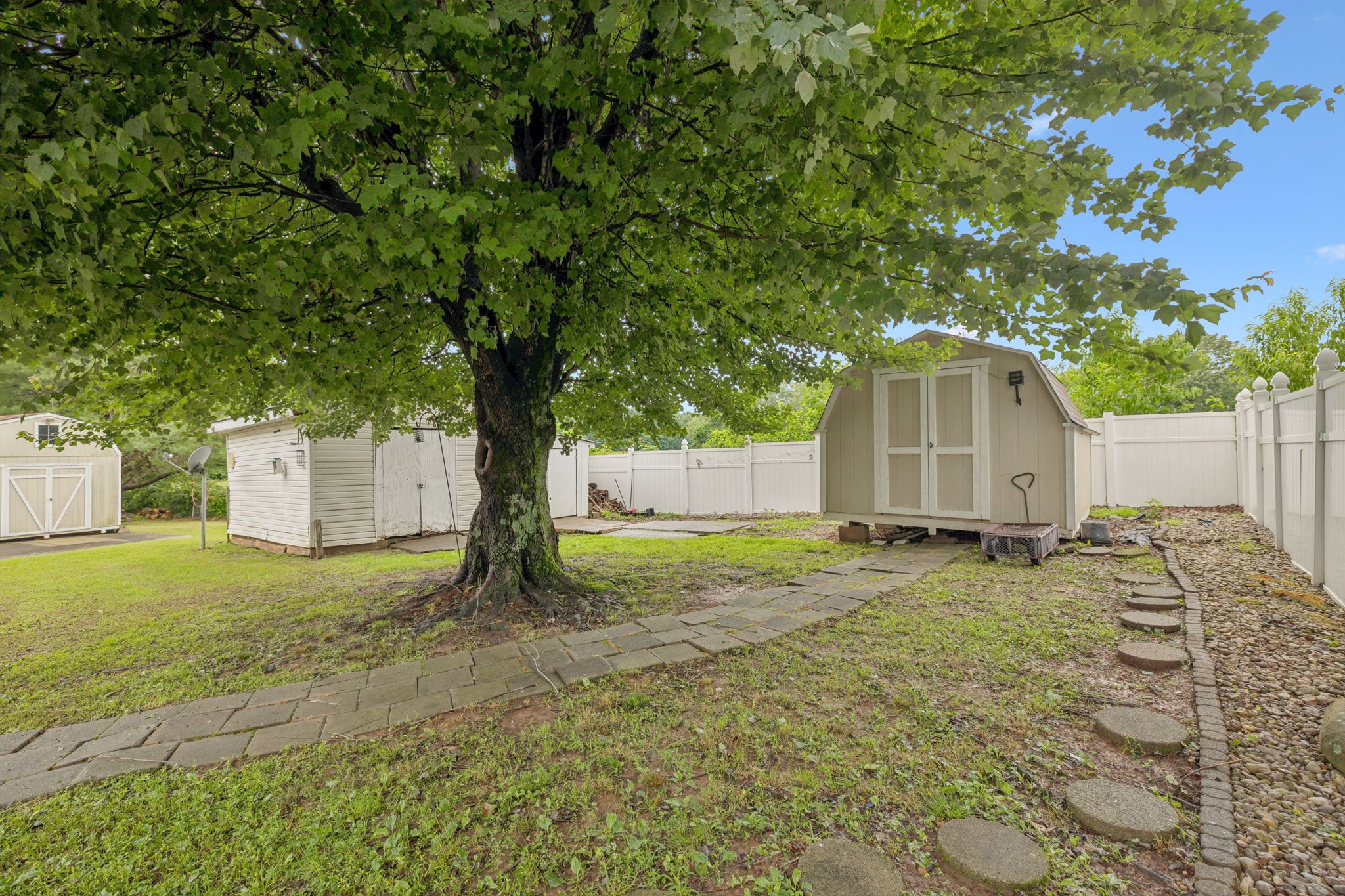 115 White Road Portland, TN 37148 - Photo 41 of 44 a house with trees in front of it