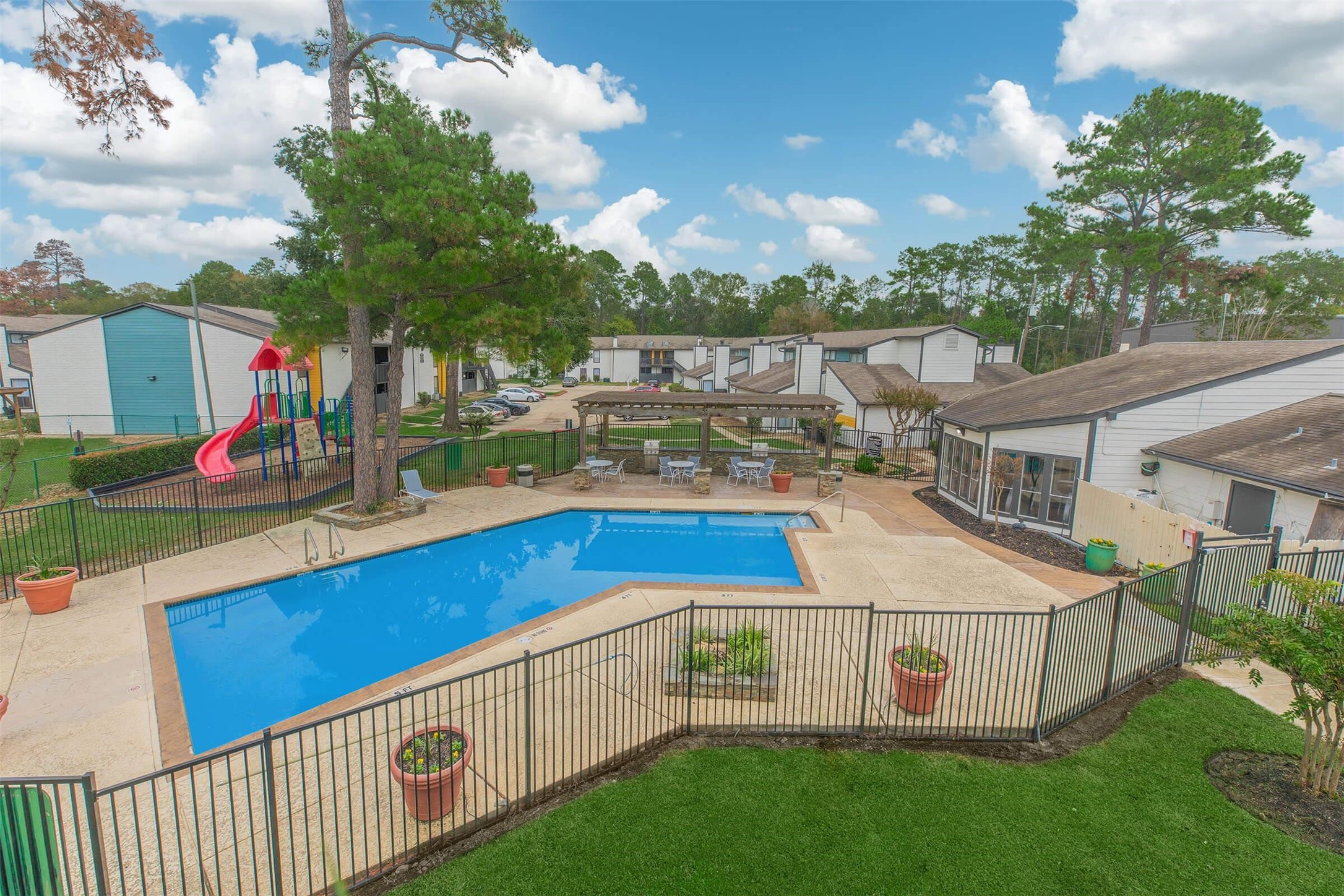 21717 Inverness Forest Boulevard, Unit 2902 Houston, TX 77073 - Photo 13 of 33 a view of a house with backyard and sitting area
