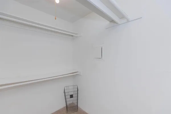 a bathroom with a sink toilet and mirror