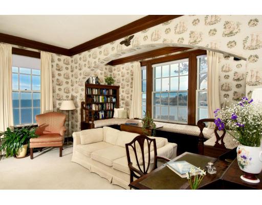 22 Crowninshield Road Marblehead, MA 01945 - Photo 4 of 6 a living room with furniture and flowers