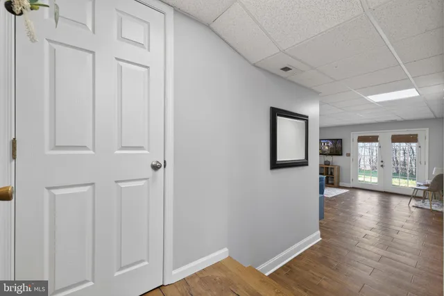 a view of a livingroom with wooden floor