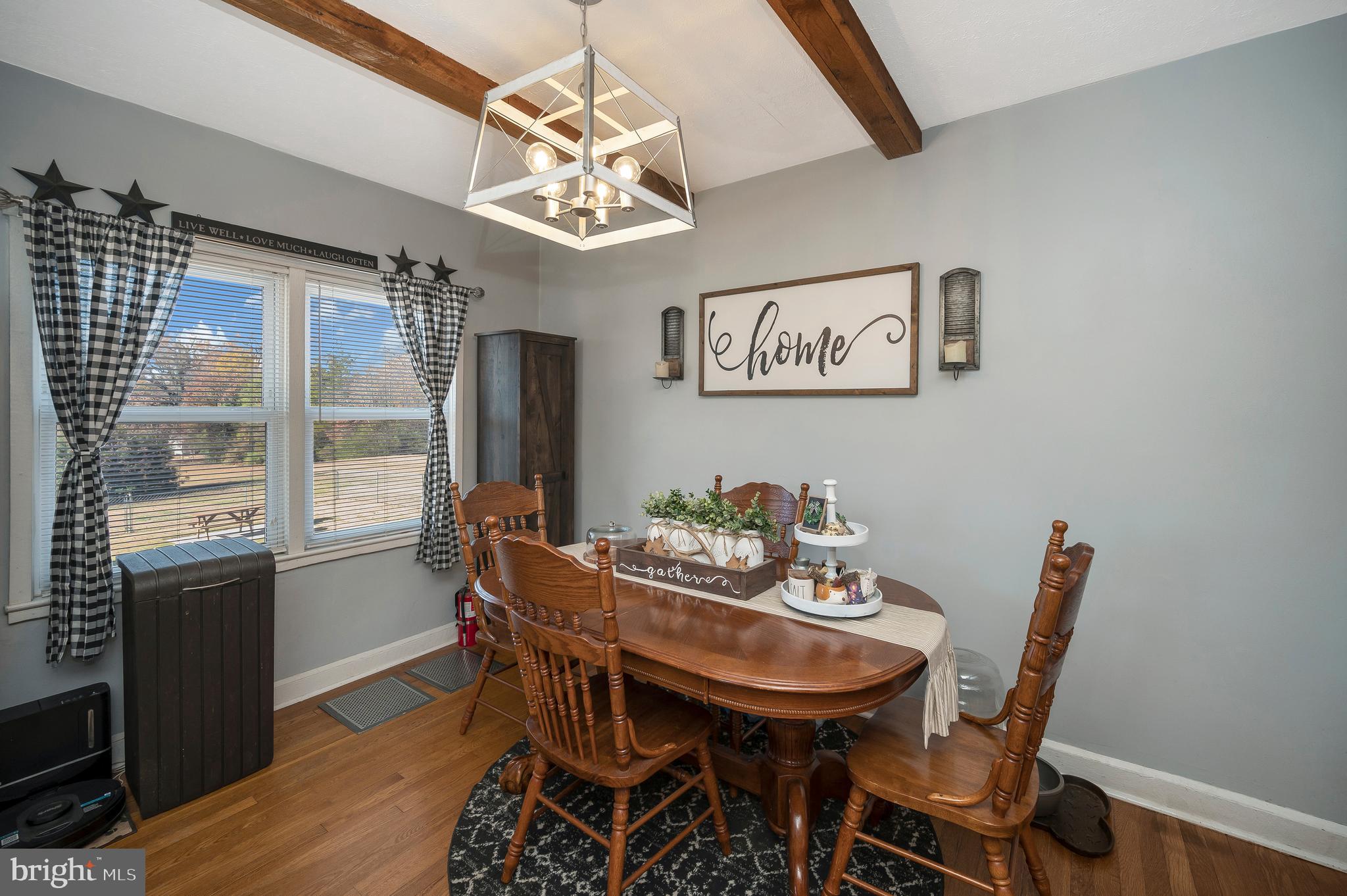 29 Leeland Road Fredericksburg, VA 22405 - Photo 13 of 30 a view of a dining room with furniture window and wooden floor