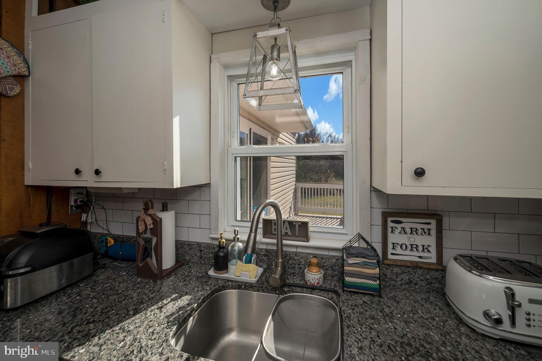 29 Leeland Road Fredericksburg, VA 22405 - Photo 17 of 30 a kitchen with a sink and a stove top oven