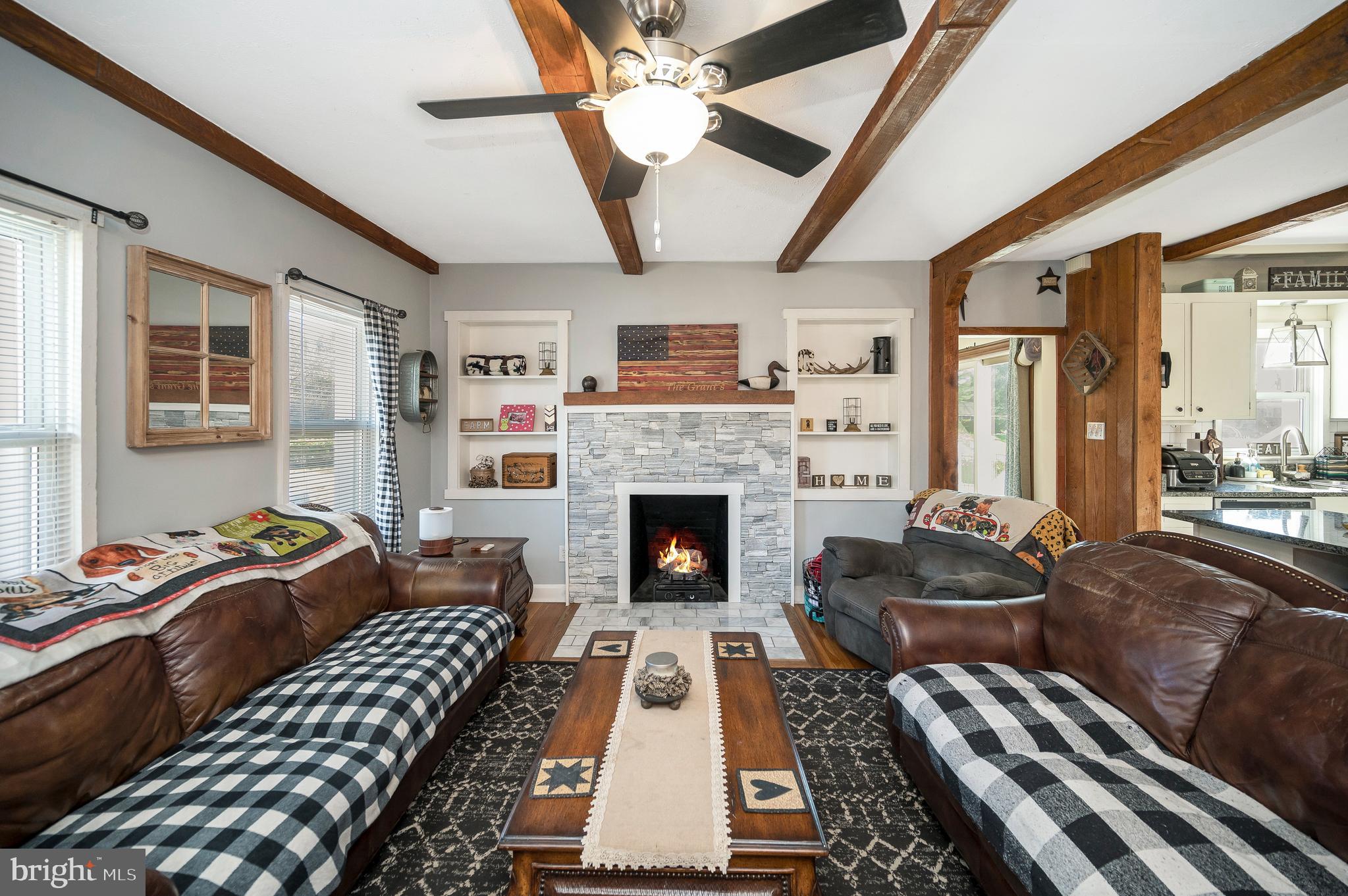 29 Leeland Road Fredericksburg, VA 22405 - Photo 10 of 30 a living room with furniture and a fireplace