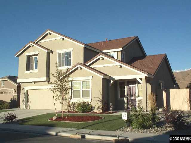 10520 Blockade Drive Reno, NV 89521 - Photo 1 of 9 a front view of a house with a yard