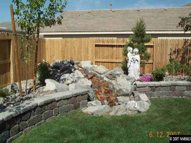 10520 Blockade Drive Reno, NV 89521 - Photo 9 of 9 a view of backyard of a house