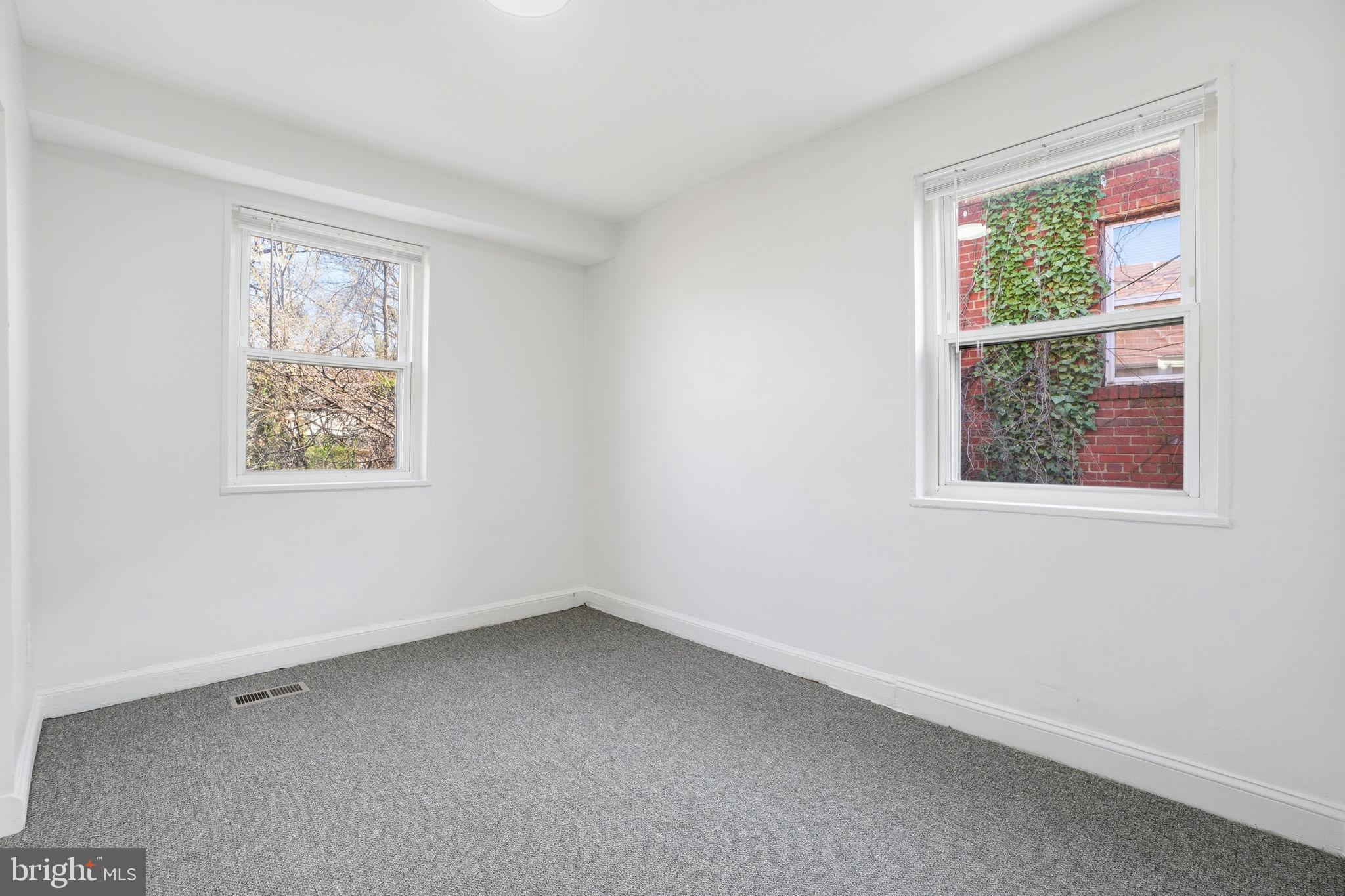 4240 Foote Street Northeast Washington, DC 20019 - Photo 22 of 38 an empty room with a window