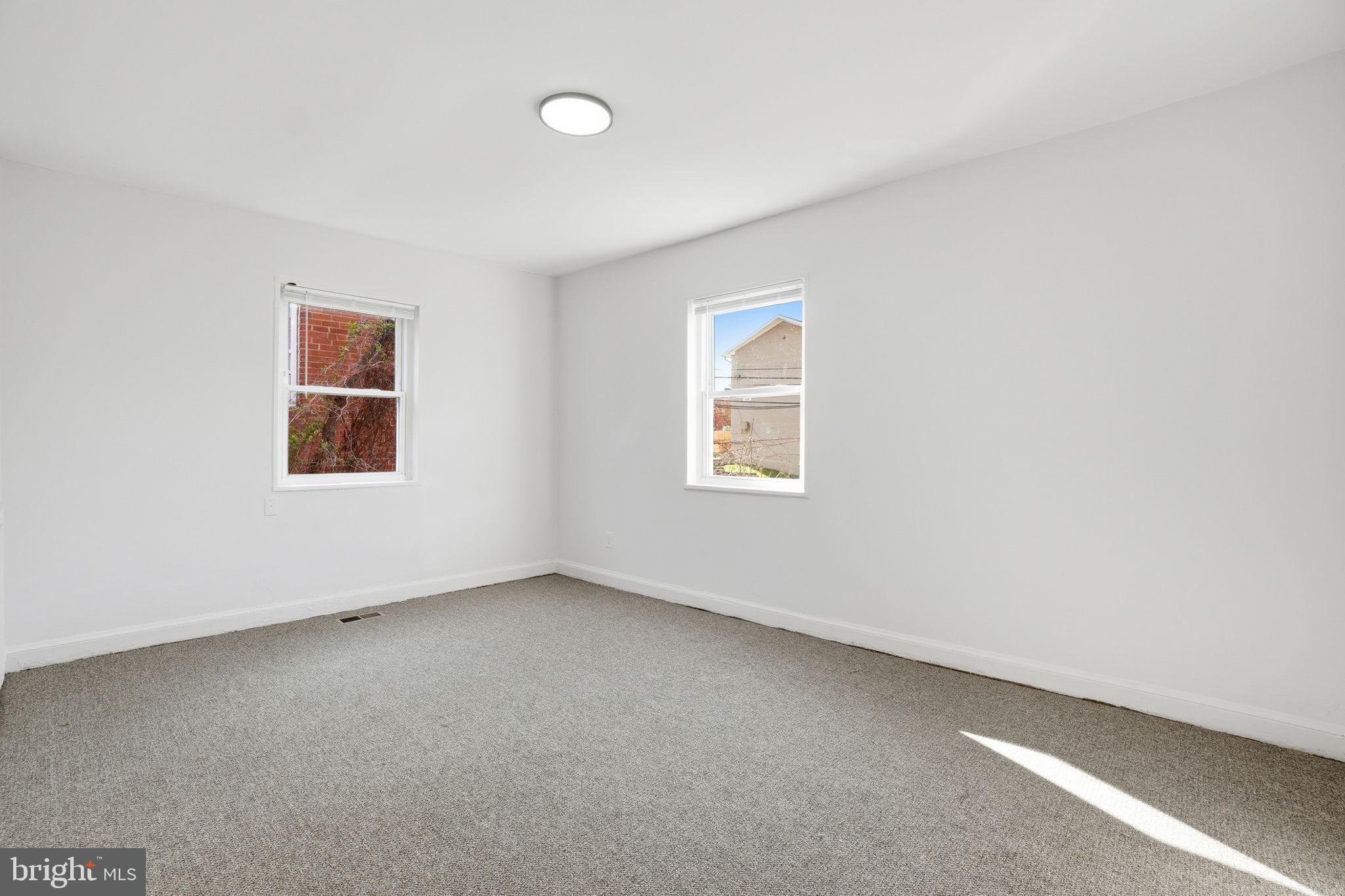 4240 Foote Street Northeast Washington, DC 20019 - Photo 25 of 38 an empty room with a window