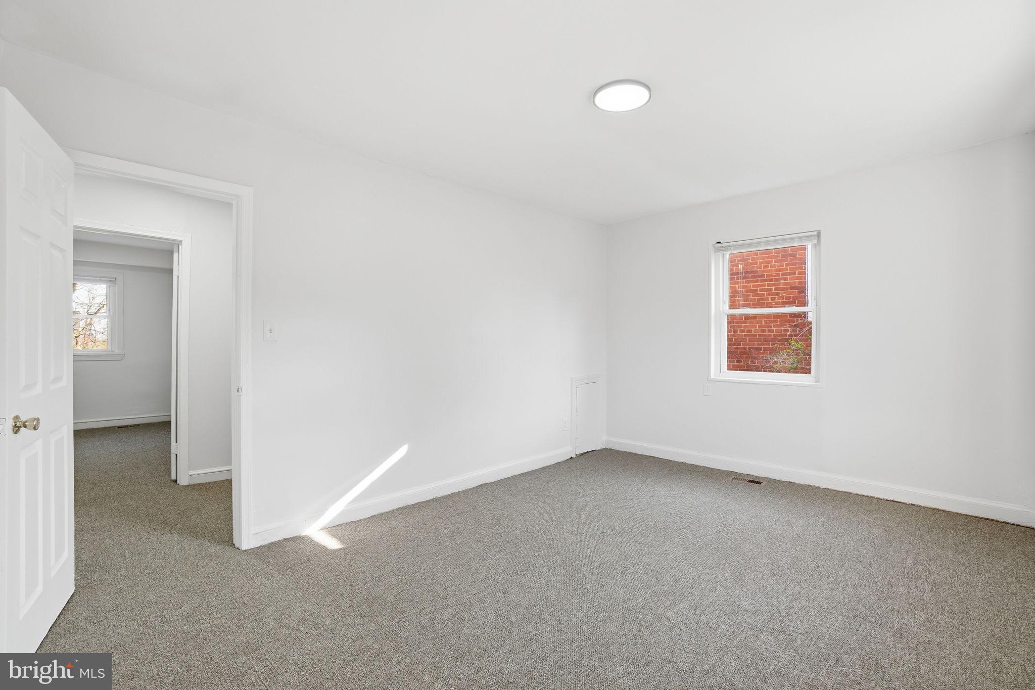 4240 Foote Street Northeast Washington, DC 20019 - Photo 26 of 38 an empty room with a window