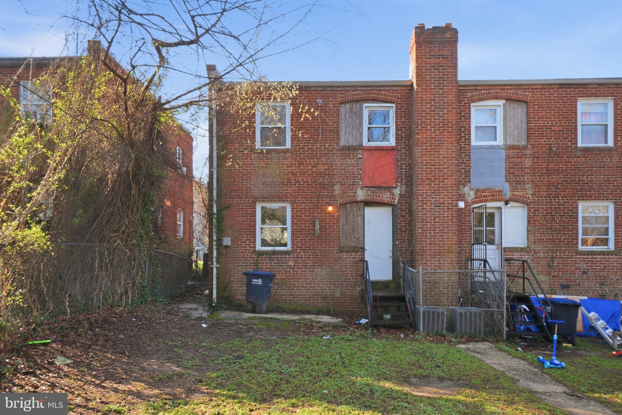 4240 Foote Street Northeast Washington, DC 20019 - Photo 33 of 38 a brick building that has a lots of windows in it