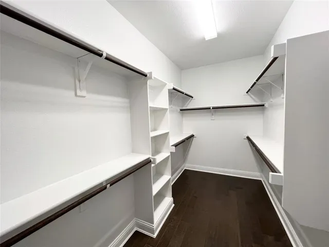 a view of an empty walk in closet