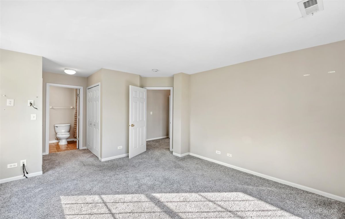 172 East River Road, Unit L Des Plaines, IL 60016 - Photo 18 of 27 a view of an empty room