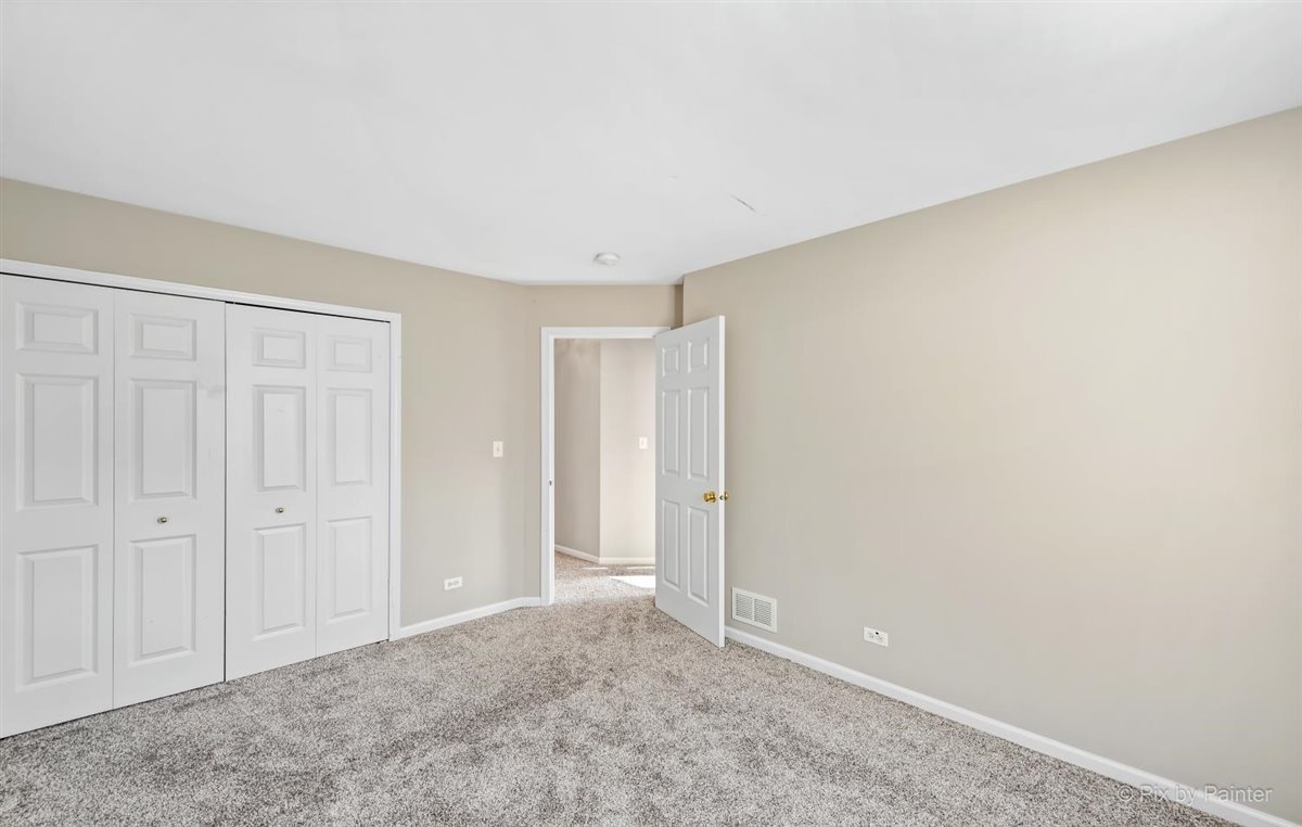 172 East River Road, Unit L Des Plaines, IL 60016 - Photo 22 of 27 a view of an empty room