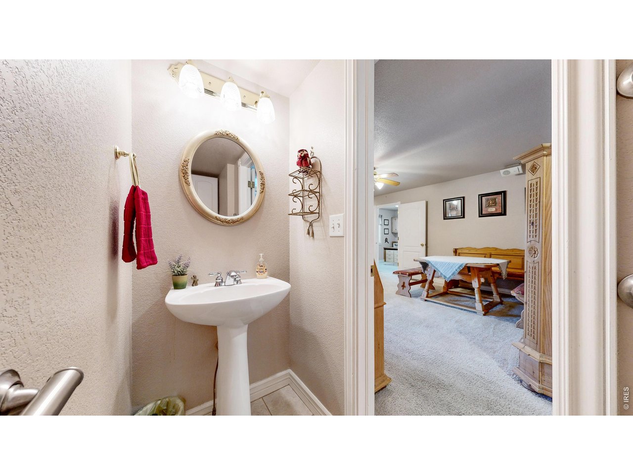 1901 74th Avenue Greeley, CO 80634 - Photo 15 of 50 Main Half Bath off Family Room