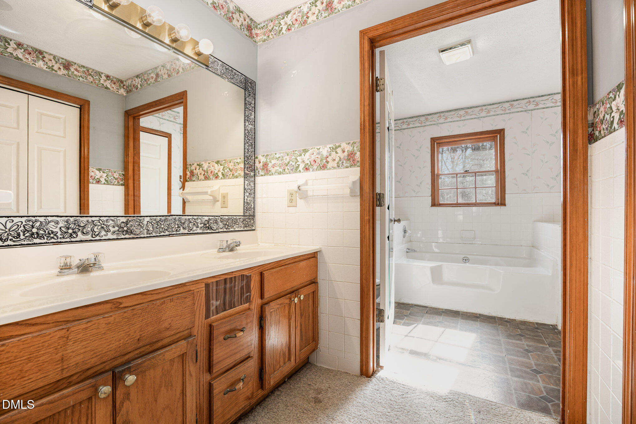 227 Bellview Road Robbins, NC 27325 - Photo 11 of 20 a bathroom with a sink a mirror and a bathtub