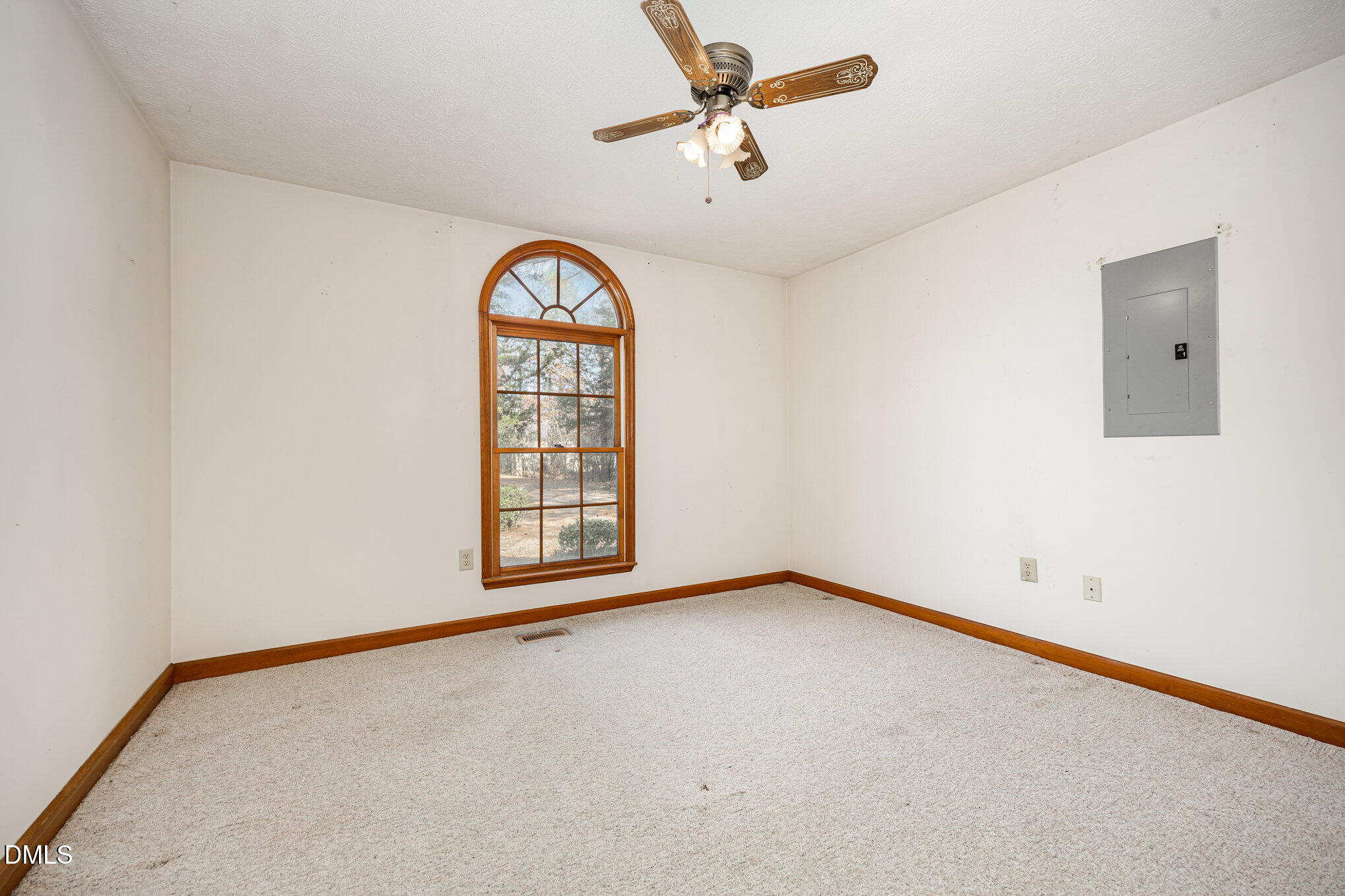 227 Bellview Road Robbins, NC 27325 - Photo 12 of 20 an empty room with windows and ceiling fan