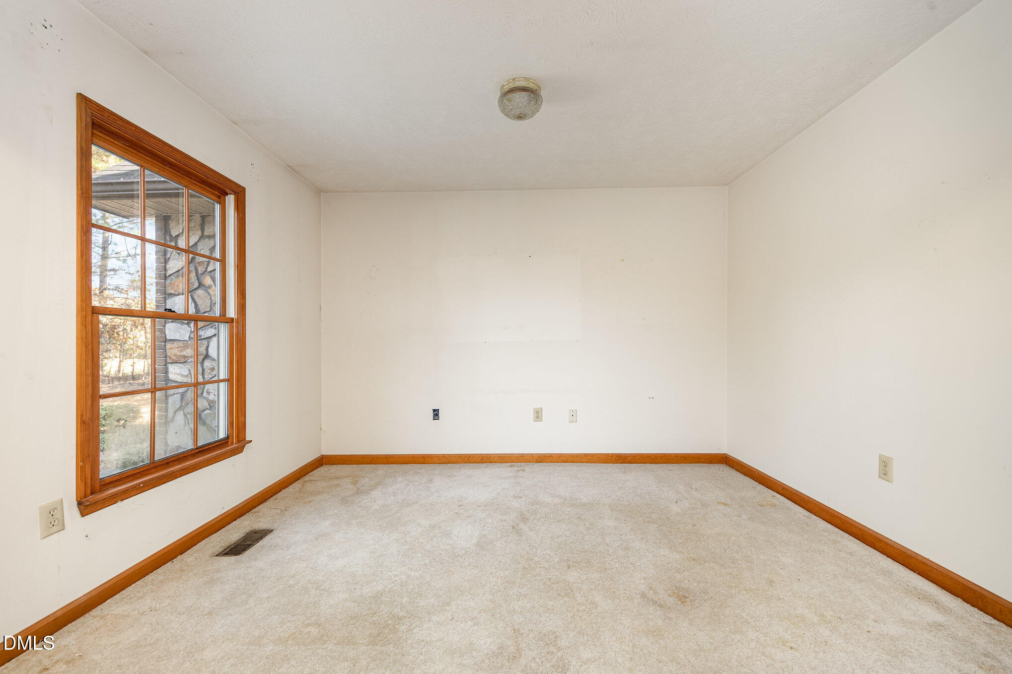 227 Bellview Road Robbins, NC 27325 - Photo 14 of 20 an empty room with a window