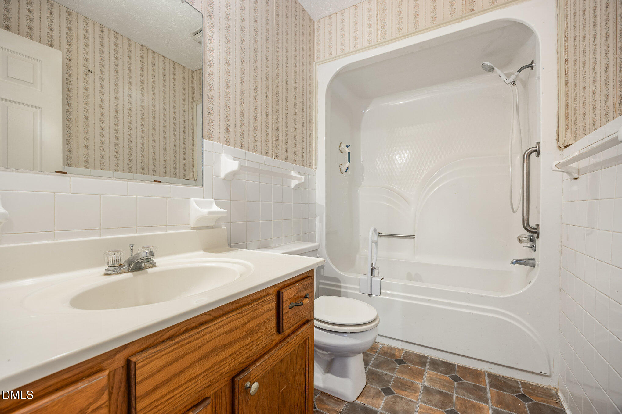 227 Bellview Road Robbins, NC 27325 - Photo 15 of 20 a bathroom with a sink a toilet and a bathtub