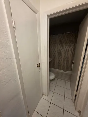 a view of bathroom with a toilet