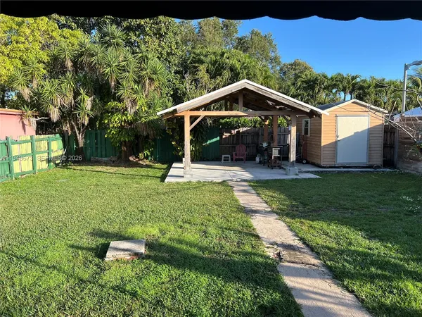 a view of a garden with a slide