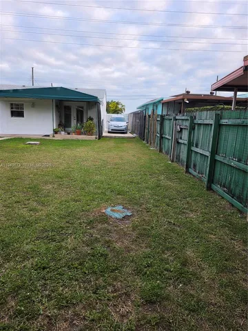 a front view of house with yard